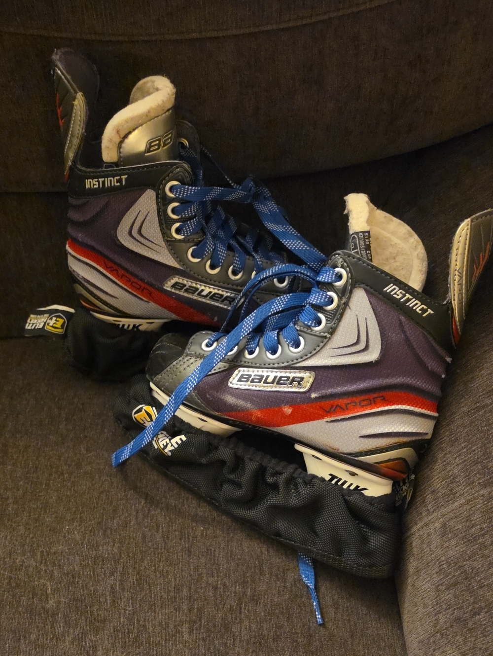 Bauer Kids Ice Hockey Skates in Purple and Blue